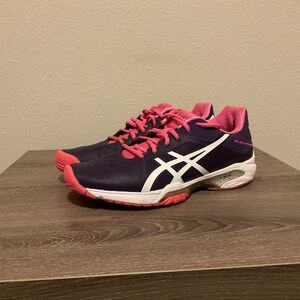 Purple and pink asics running shoes size 7.5